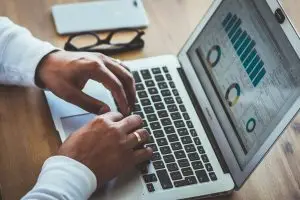 businessman researching about the latest voip statistics and trends