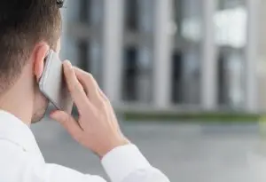 man recording a phone call using a call recording app