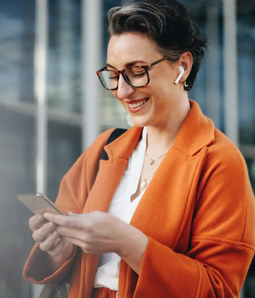 Woman using Ultatel hub app to text on the go